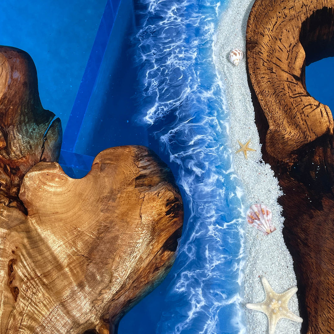 Artistic depiction of a beach scene with wooden elements and starfish.