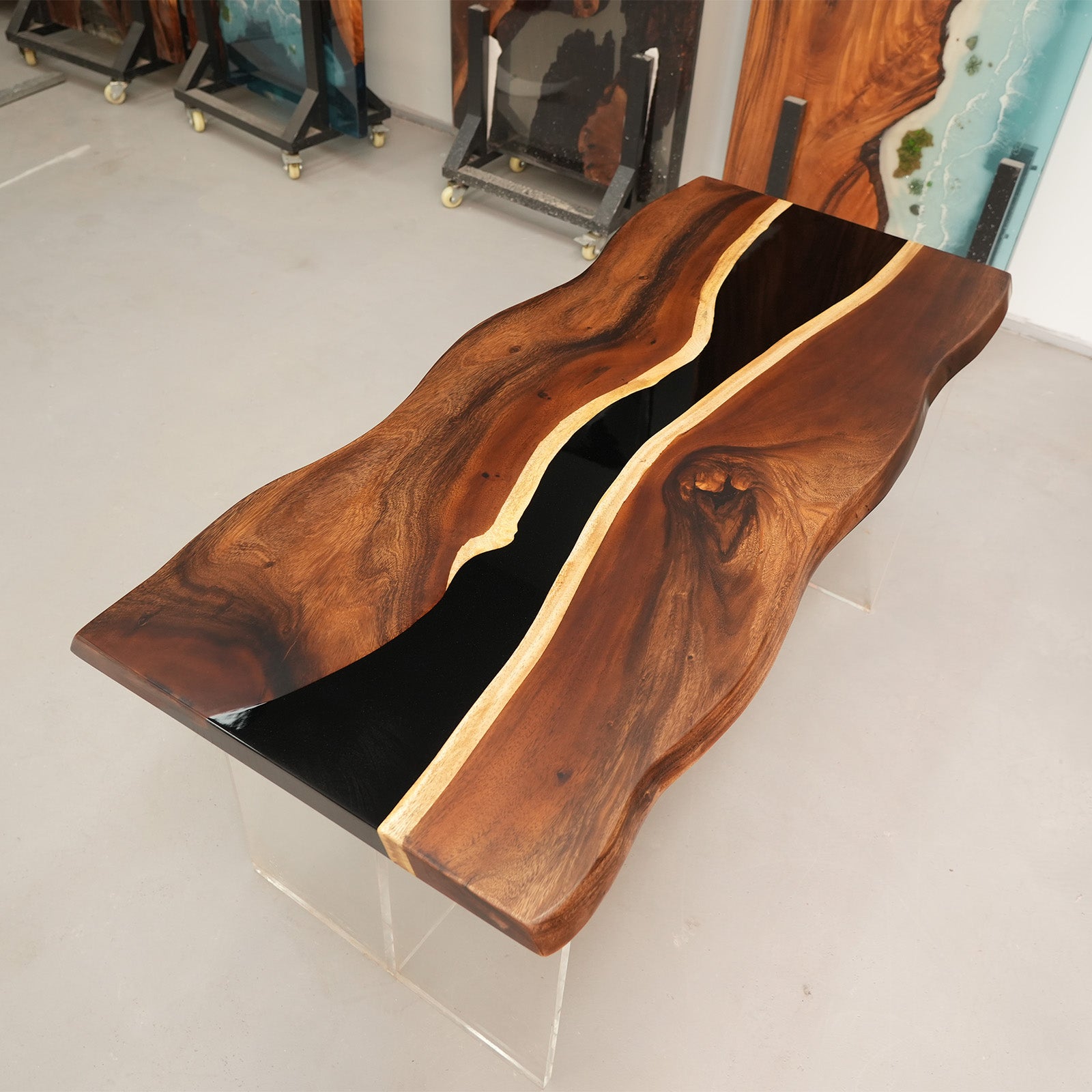 Finished walnut black epoxy river table after full craftsmanship