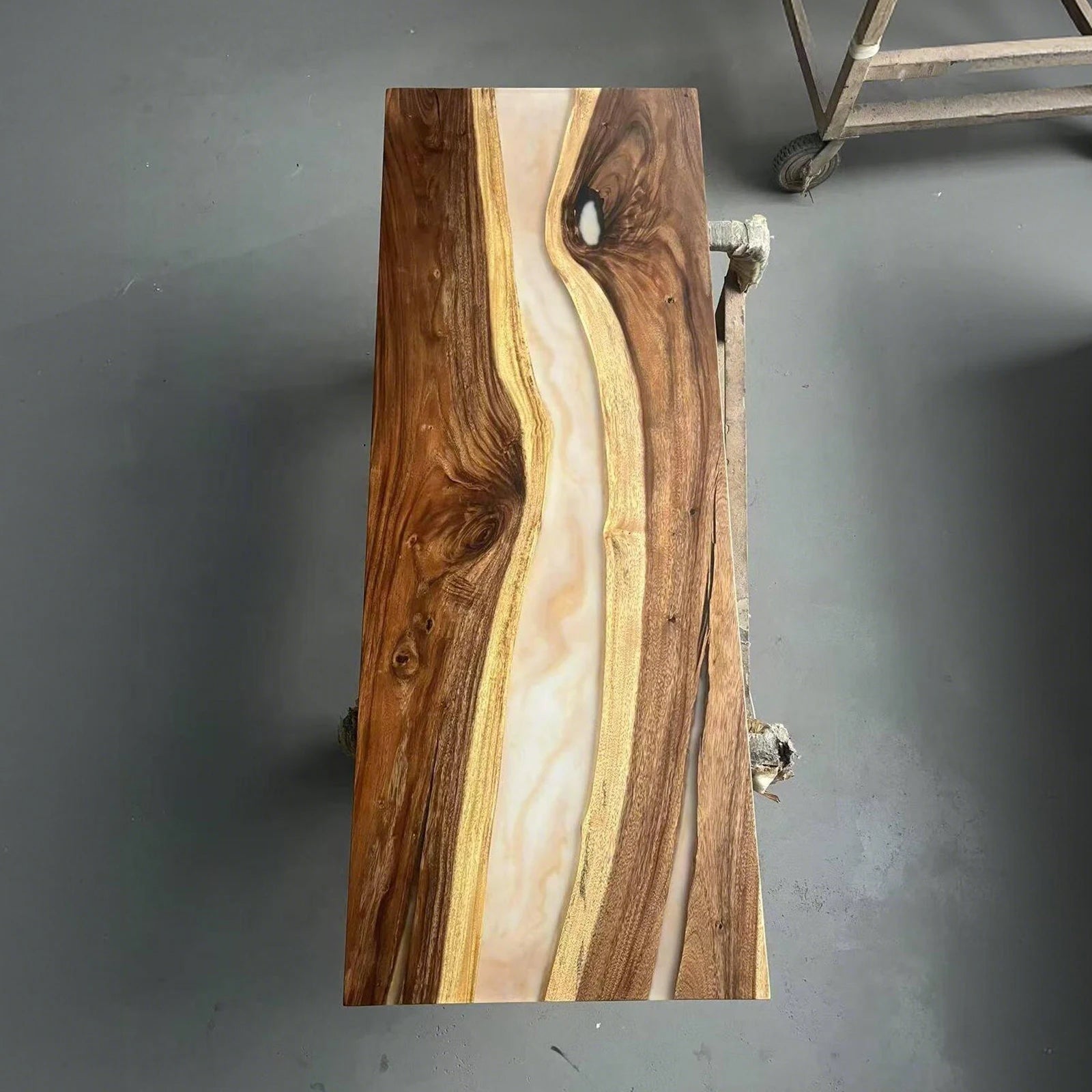 Finished black walnut table with Lunar Silk resin and gold veins handcrafted by SeawaveTable