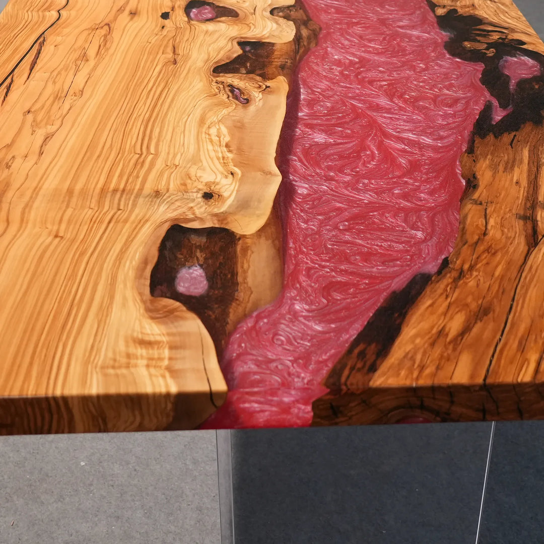 Full-gloss Olive Wood and pearlescent red epoxy tabletop by SeawaveTable