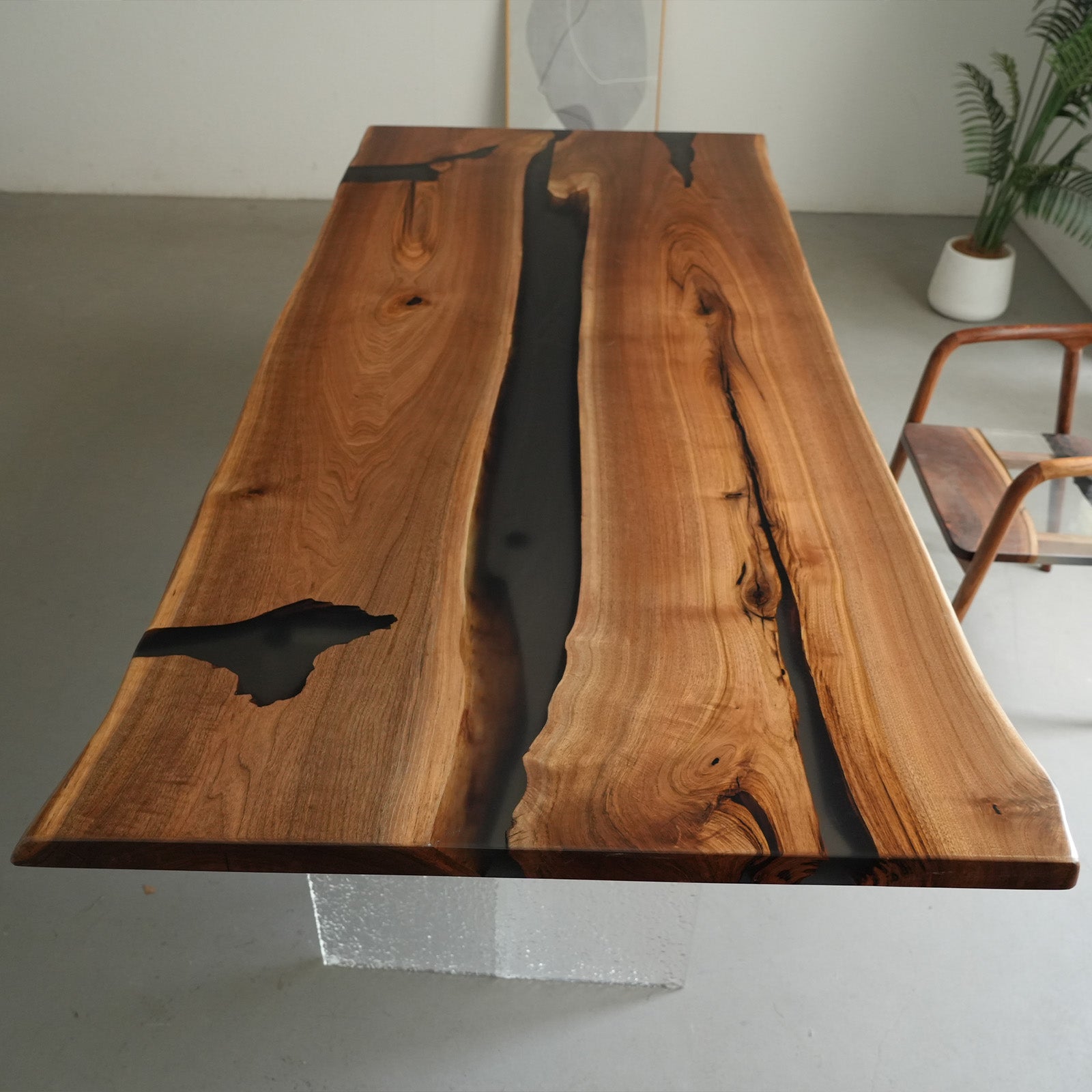 Glossy epoxy resin and walnut wood conference room table with natural edges