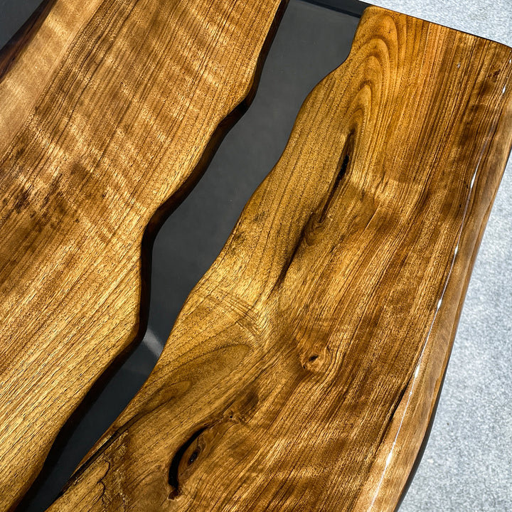Handmade live edge river table in black walnut and epoxy