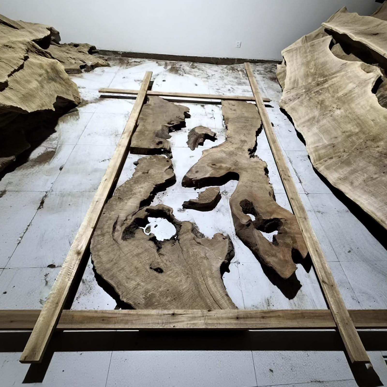 Handcrafted golden camphor wood table with transparent blue resin, white sand, starfish, and seashells for a coastal home in Lewisberry, PA near me.