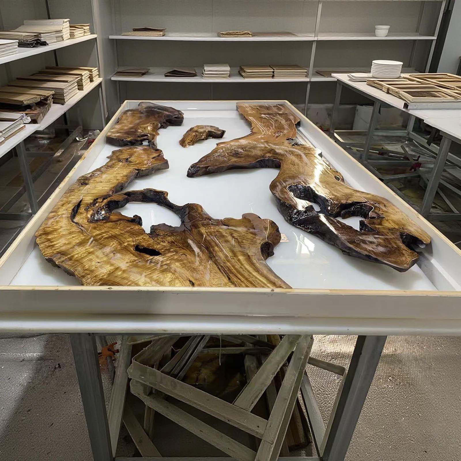 Unique handcrafted golden camphor wood coastal resin table displayed in a bright home setting in Lewisberry, PA.