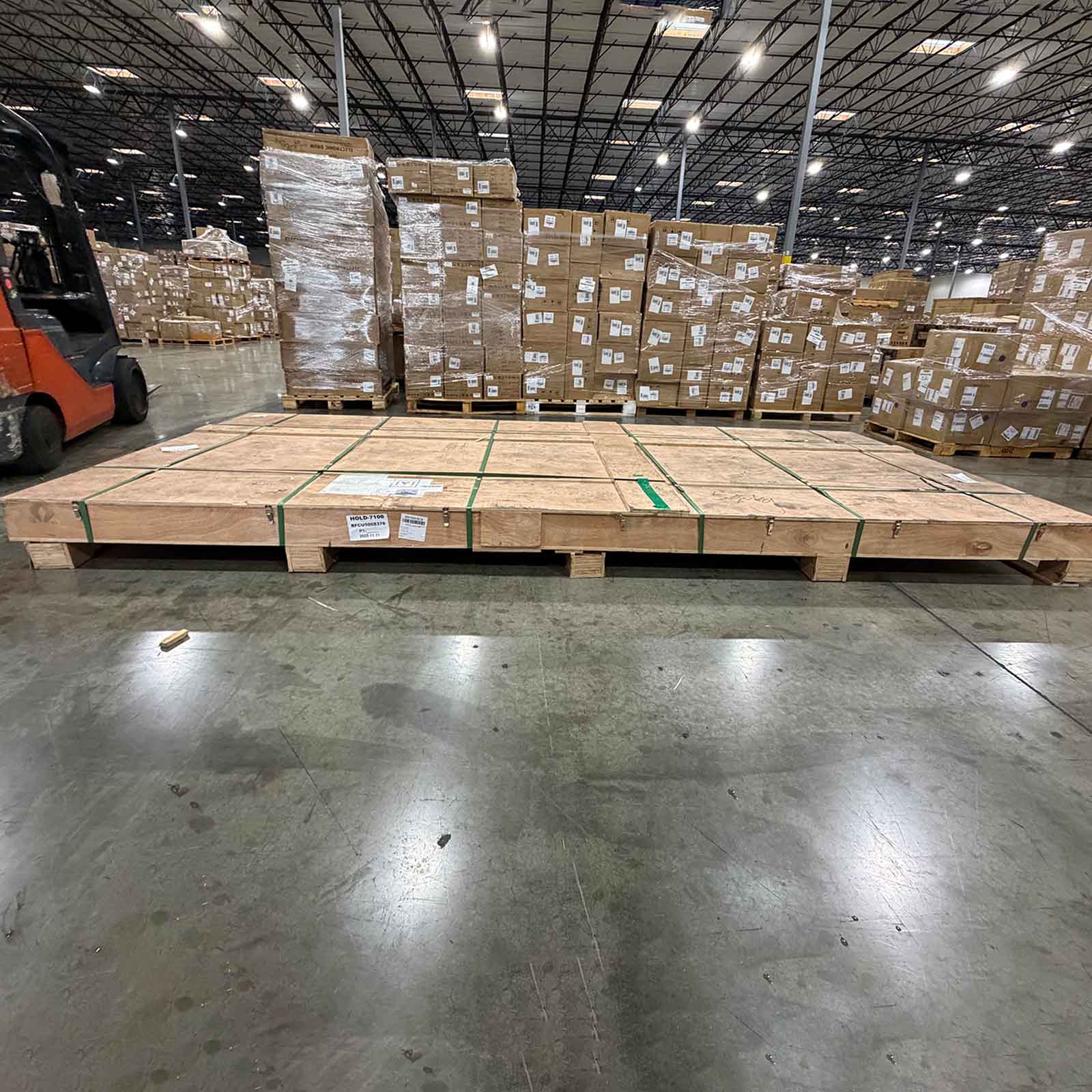 Detailed view of ocean-blue epoxy resin river flowing through golden camphor wood table.