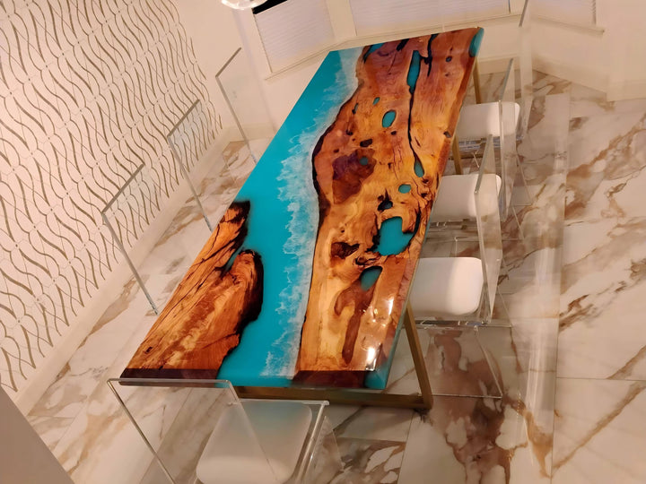 Close-up of shimmering Golden Camphor wood grain with ocean blue resin