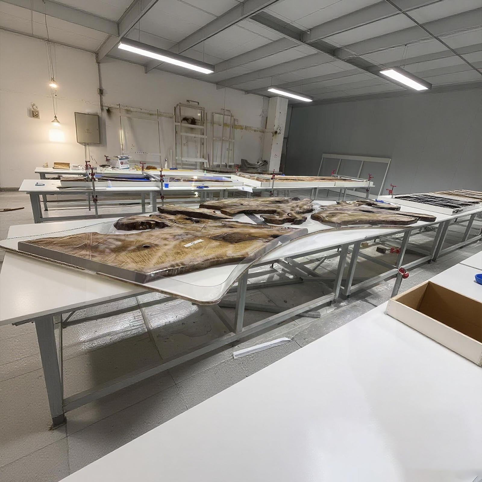 Golden camphor ocean resin table used as a bar table, blending coastal style with handcrafted wood design.