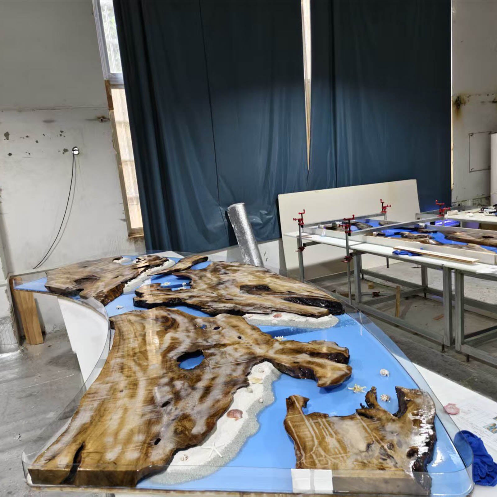 One-of-a-kind handcrafted golden camphor river resin table with ocean-inspired epoxy and live edges.