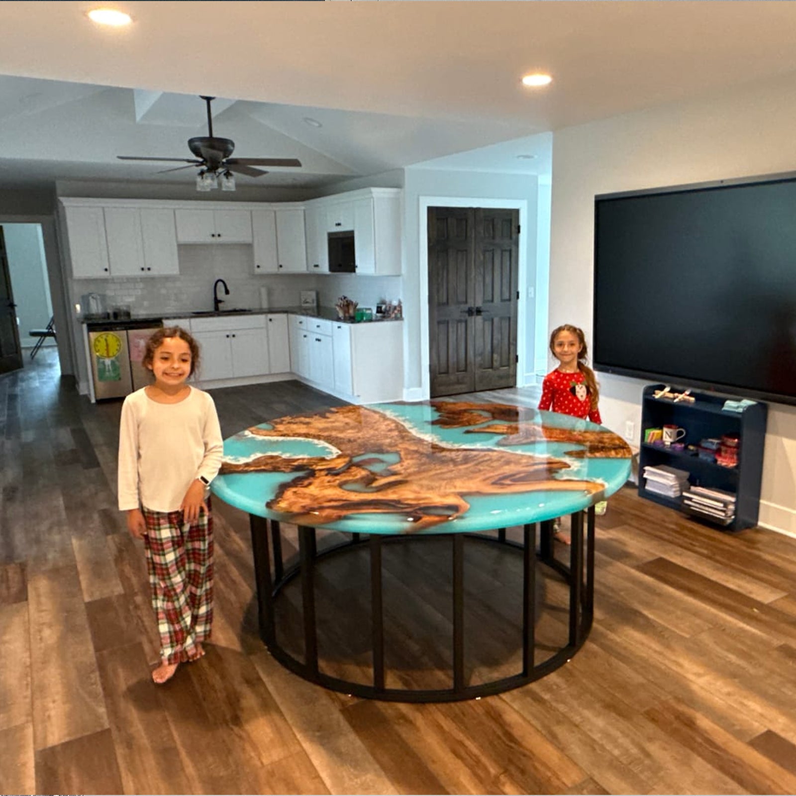 Handcrafted Golden Camphor round resin table featuring Ocean Serenity wave design