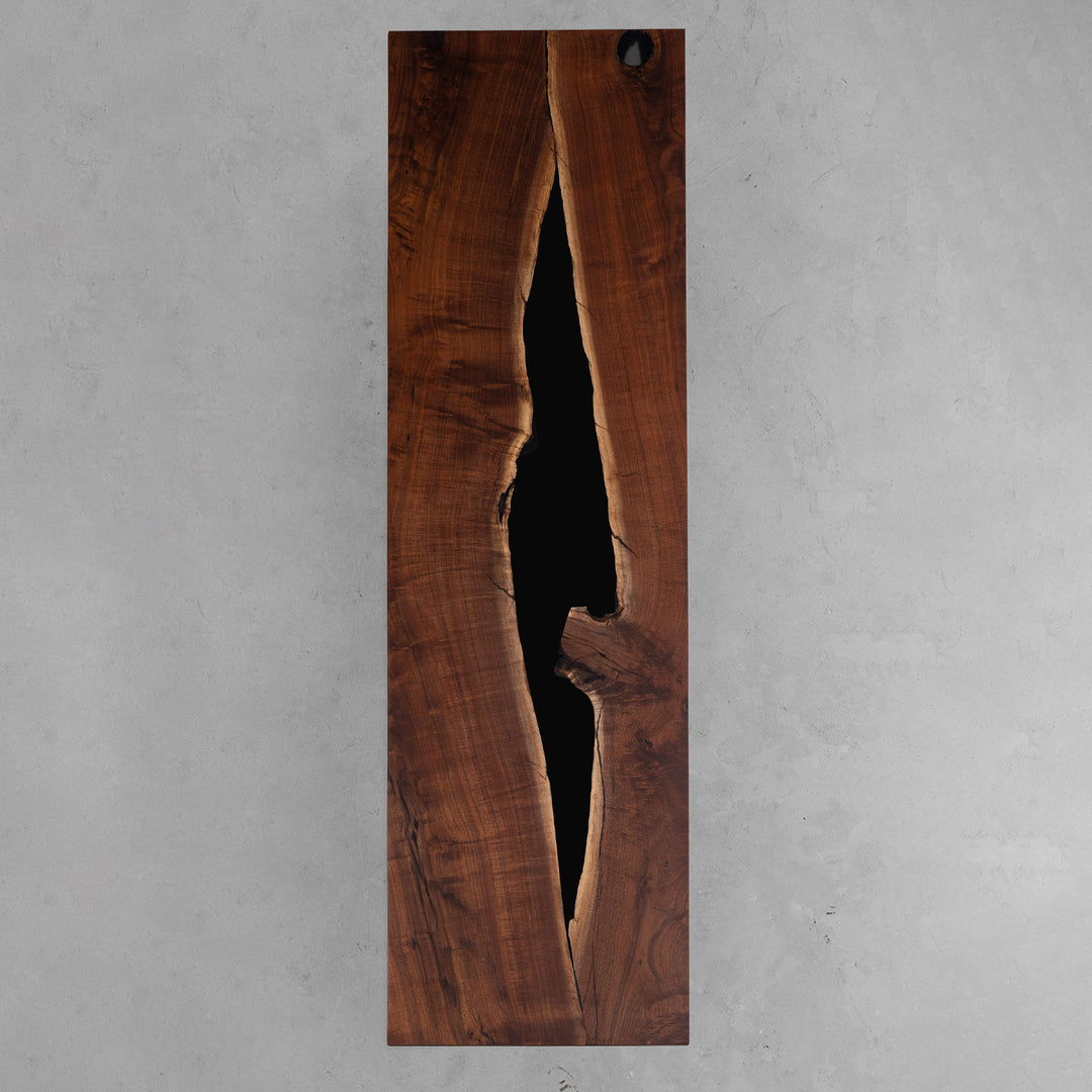 Straight edge detail of matte walnut and glossy resin executive meeting table