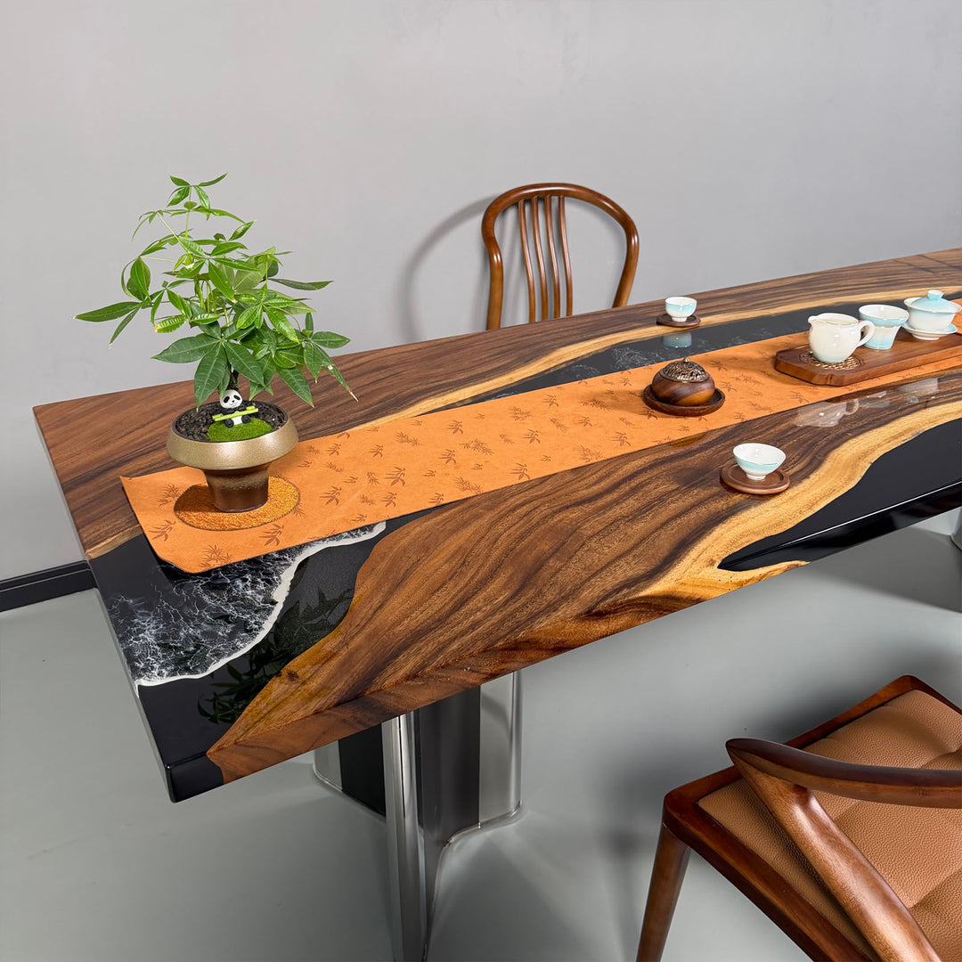 High gloss walnut table with black resin river and white ocean wave pattern