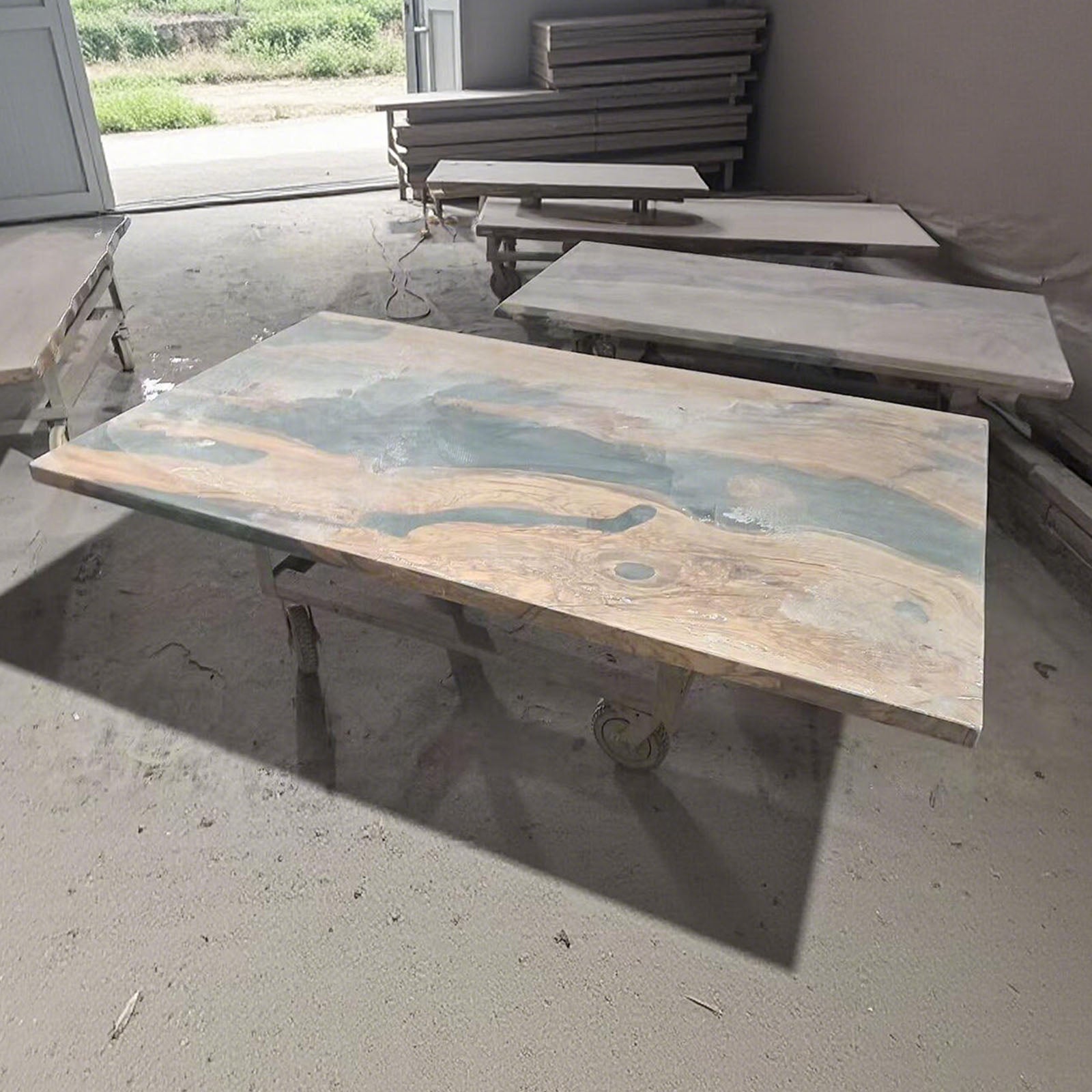 Pouring glossy Jade Oasis resin into olive wood table for Alison’s sunlit dining room.