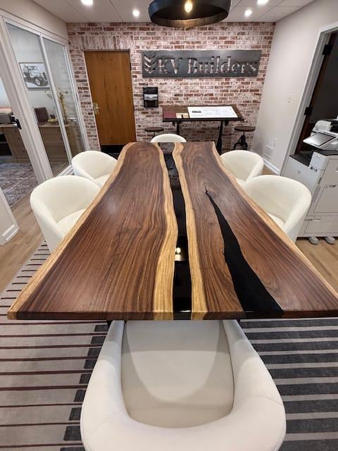 Overview of Kenneth’s Black Walnut and black resin meeting table in his Ridgewood, NJ studio.