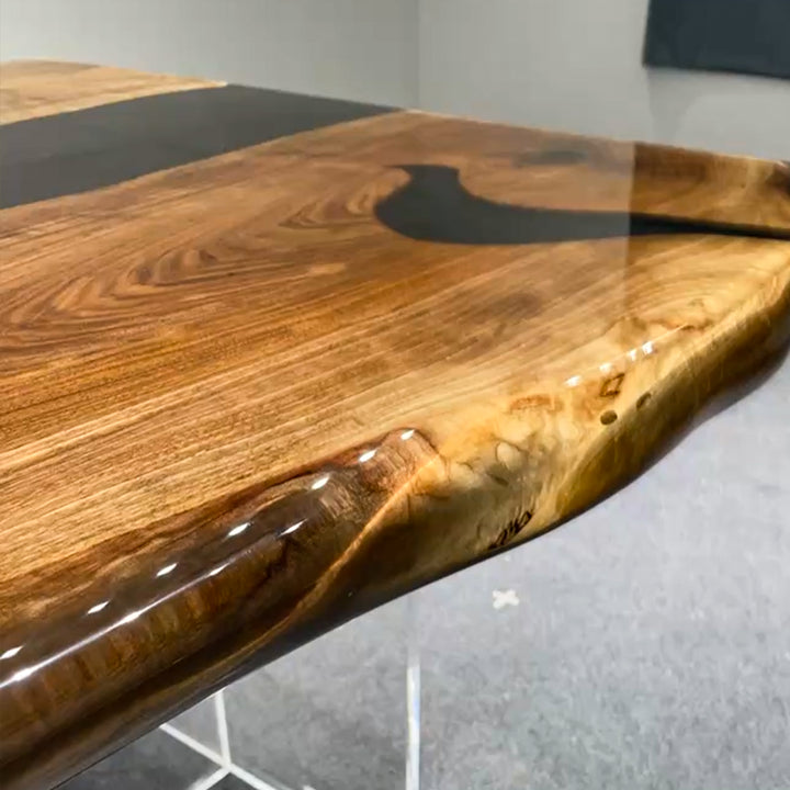 Live edge conference table with black resin river design