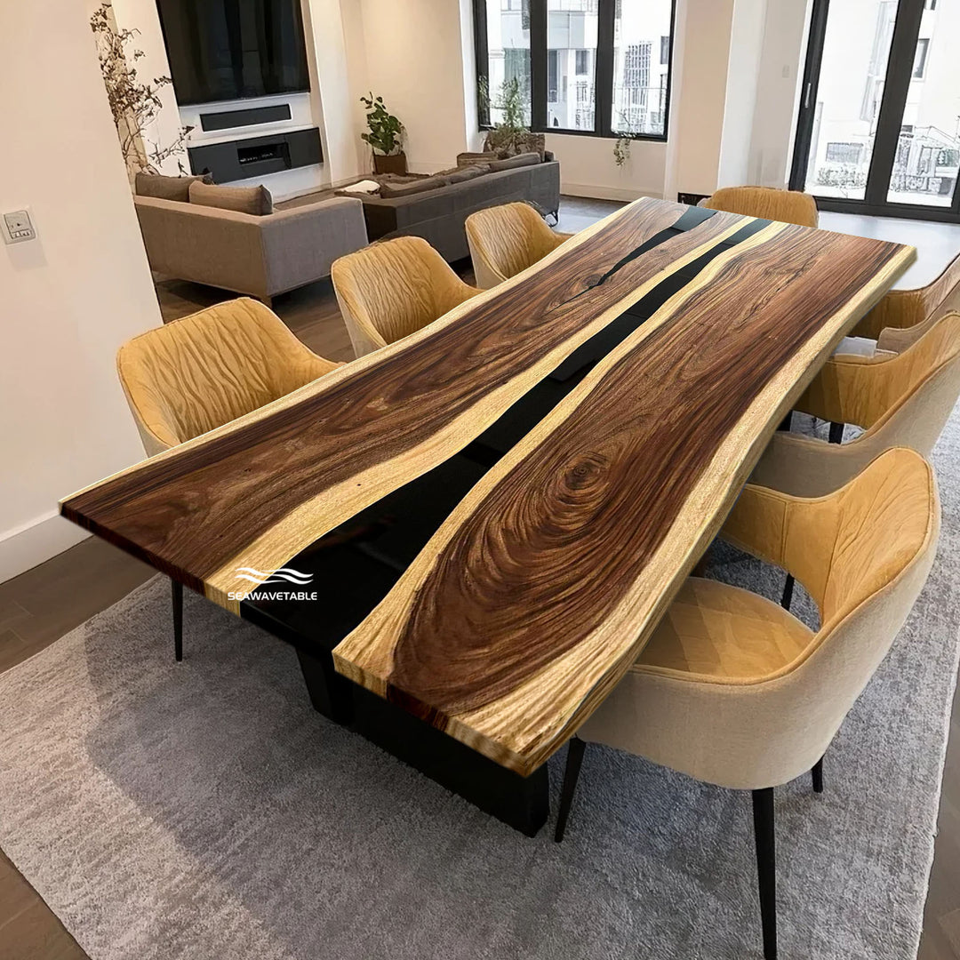 Wooden dining table with a live edge design in a modern living room setting.