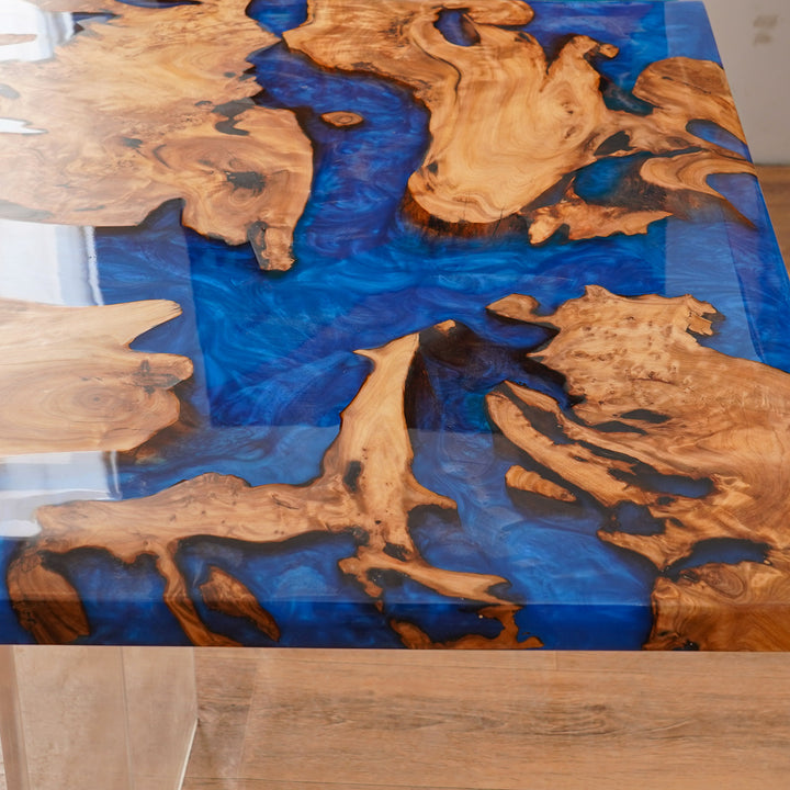 Table with blue resin and wood design