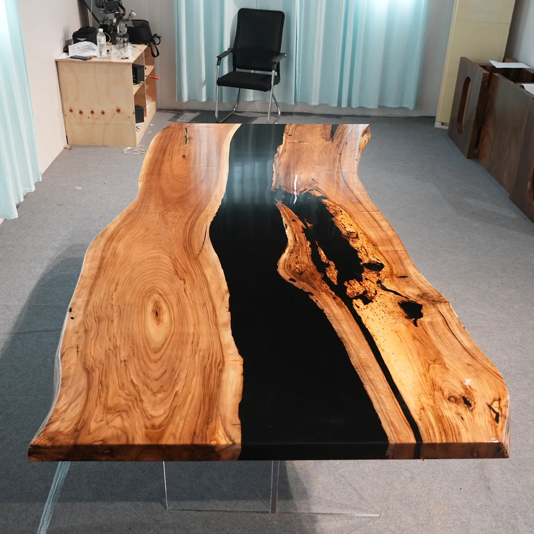 Black Walnut live edge table with irregular glossy black epoxy sections by SeawaveTable