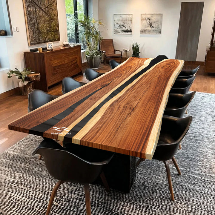 Wooden dining table with black resin accents in a modern room with chairs and decor.
