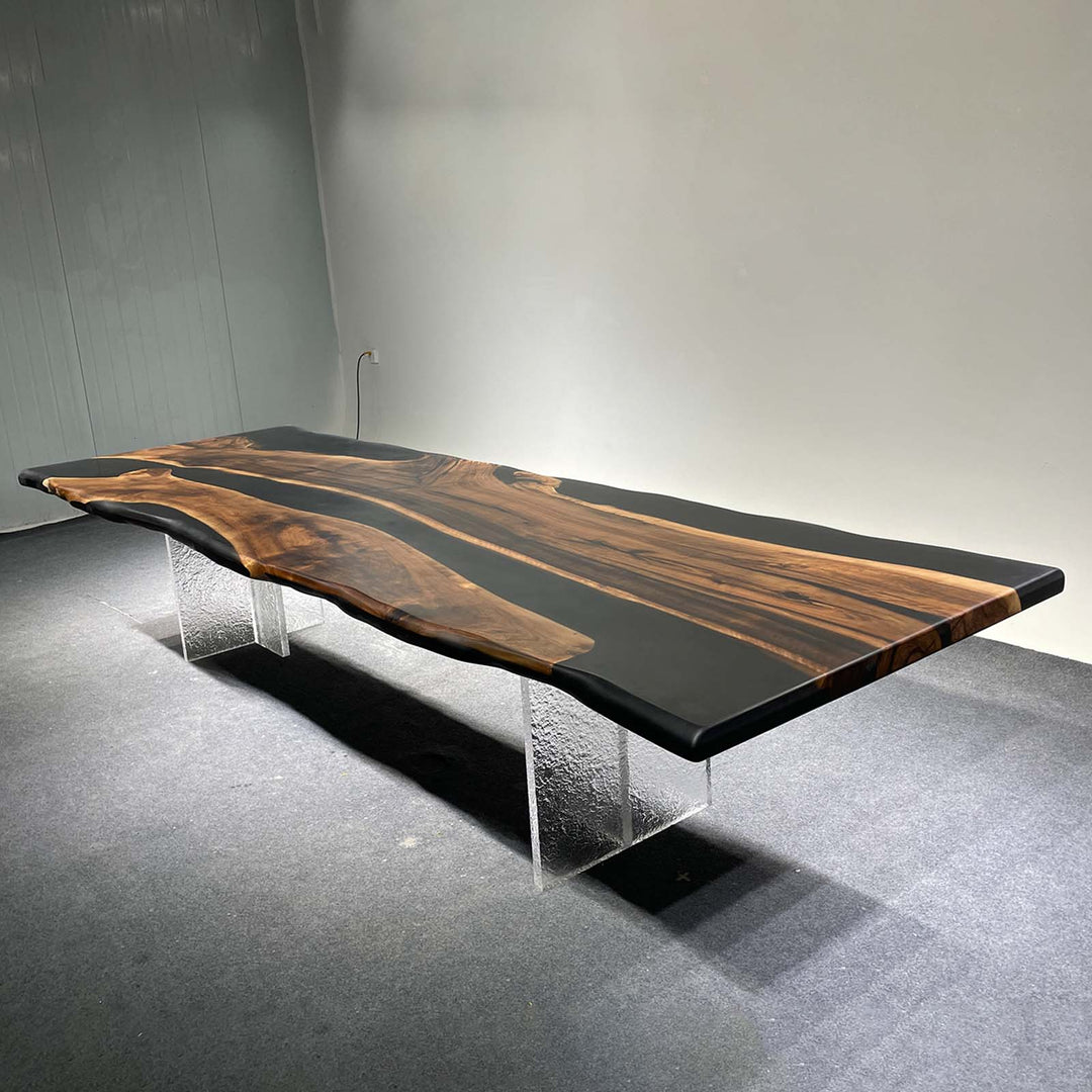 Modern interior dining room featuring black walnut epoxy table with luxury minimalist home decor styling