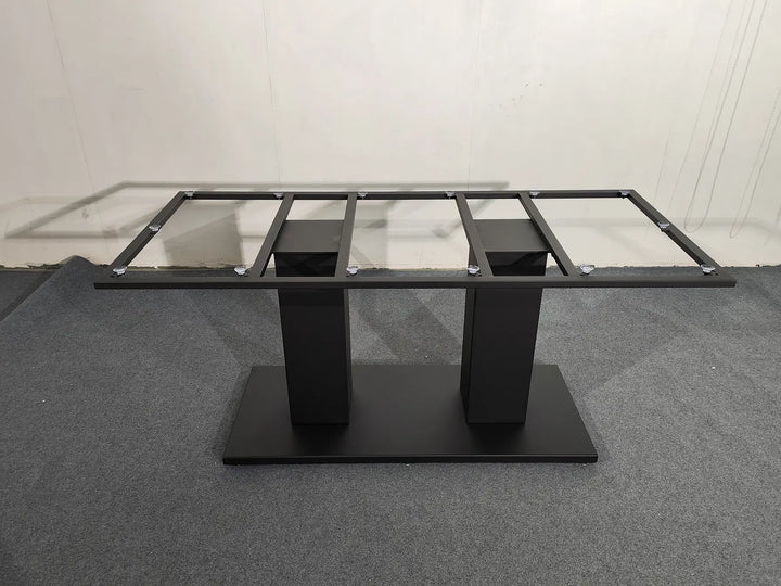 Front view of the MTL14 black metal table base featuring two rectangular pedestal columns, a wide floor plate, and an upper support frame