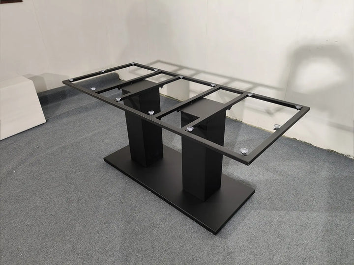 Elevated angled view of the MTL14 metal table base showing its open rectangular tabletop support frame