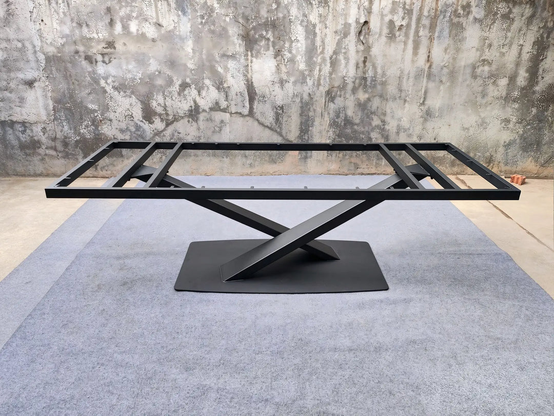 Full view of the MTL17 X-shaped metal table base with its rectangular upper support frame and floor plate