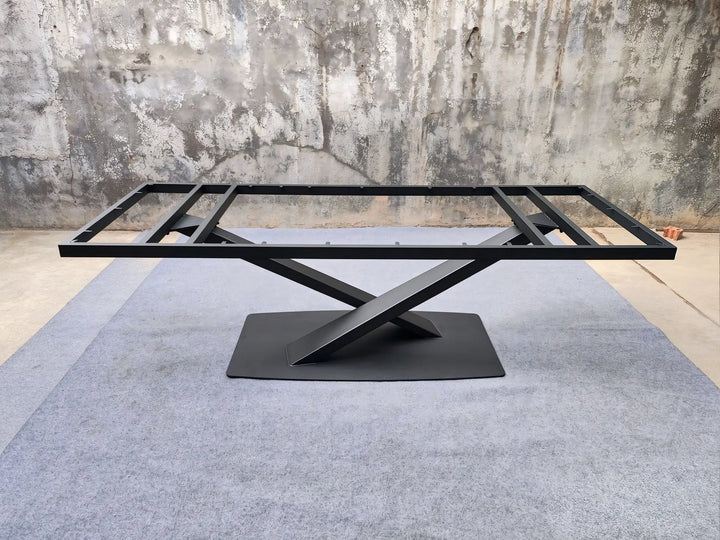 Full view of the MTL17 X-shaped metal table base with its rectangular upper support frame and floor plate