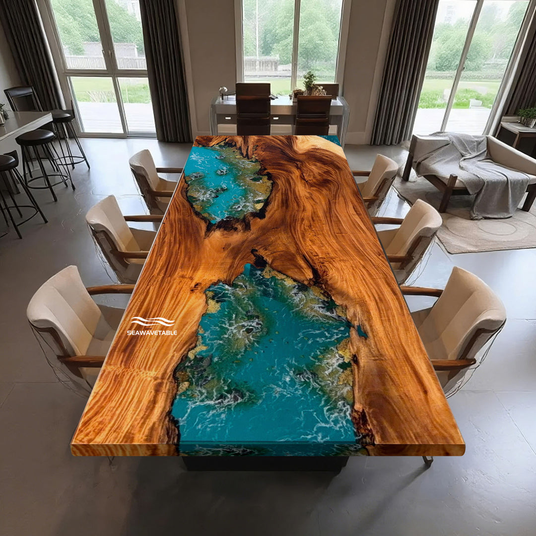 Close-up of ocean blue resin river with natural stone inlay and coastal landscape details