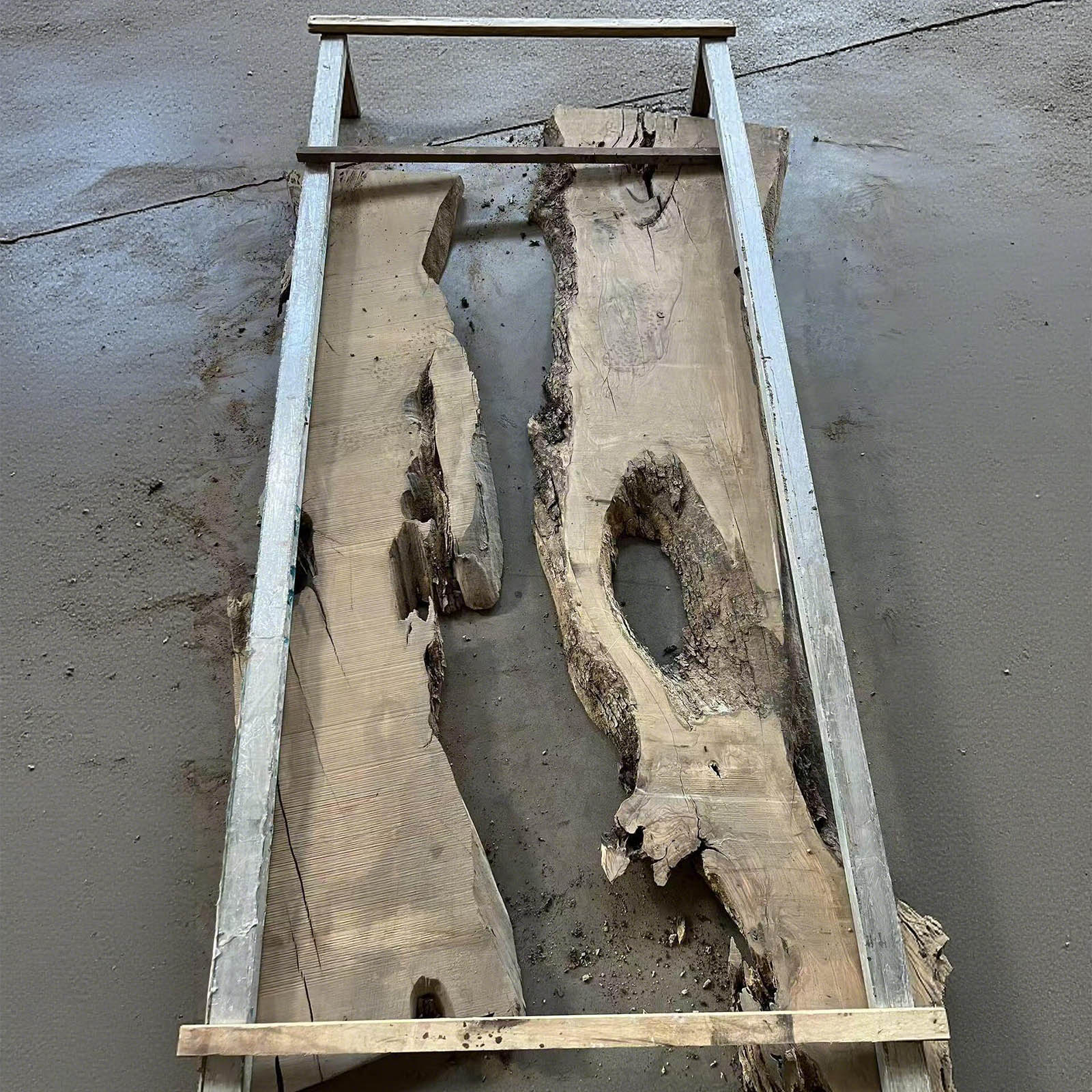 Top view of California Luxe olive wood river table with black epoxy CRT-213.