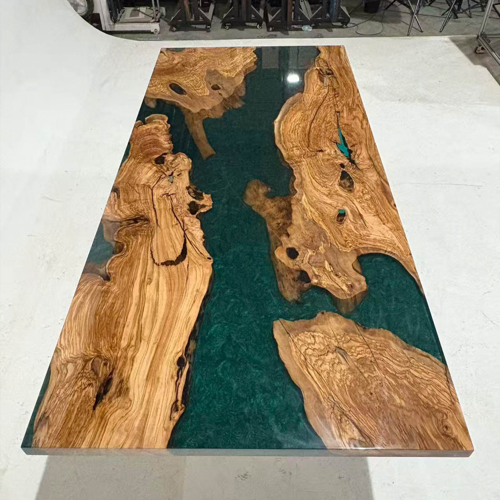 Olive wood console table featuring Mystic Lagoon epoxy river design, elegant handcrafted furniture.