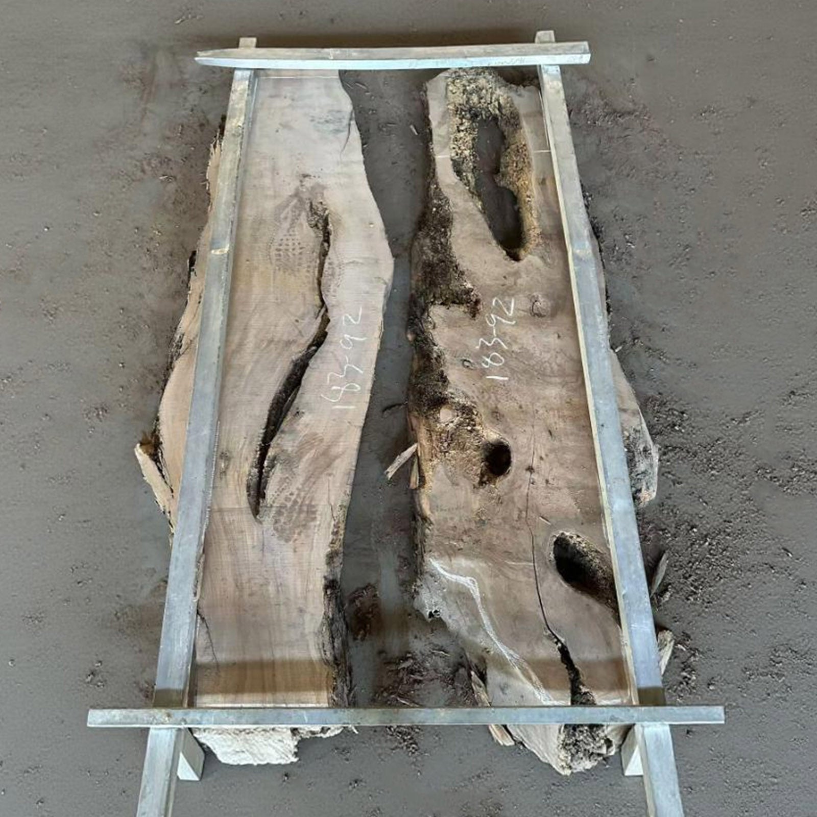 Handcrafted olive wood dining table with Mystic Lagoon blue-green epoxy river, elegant solid wood design.