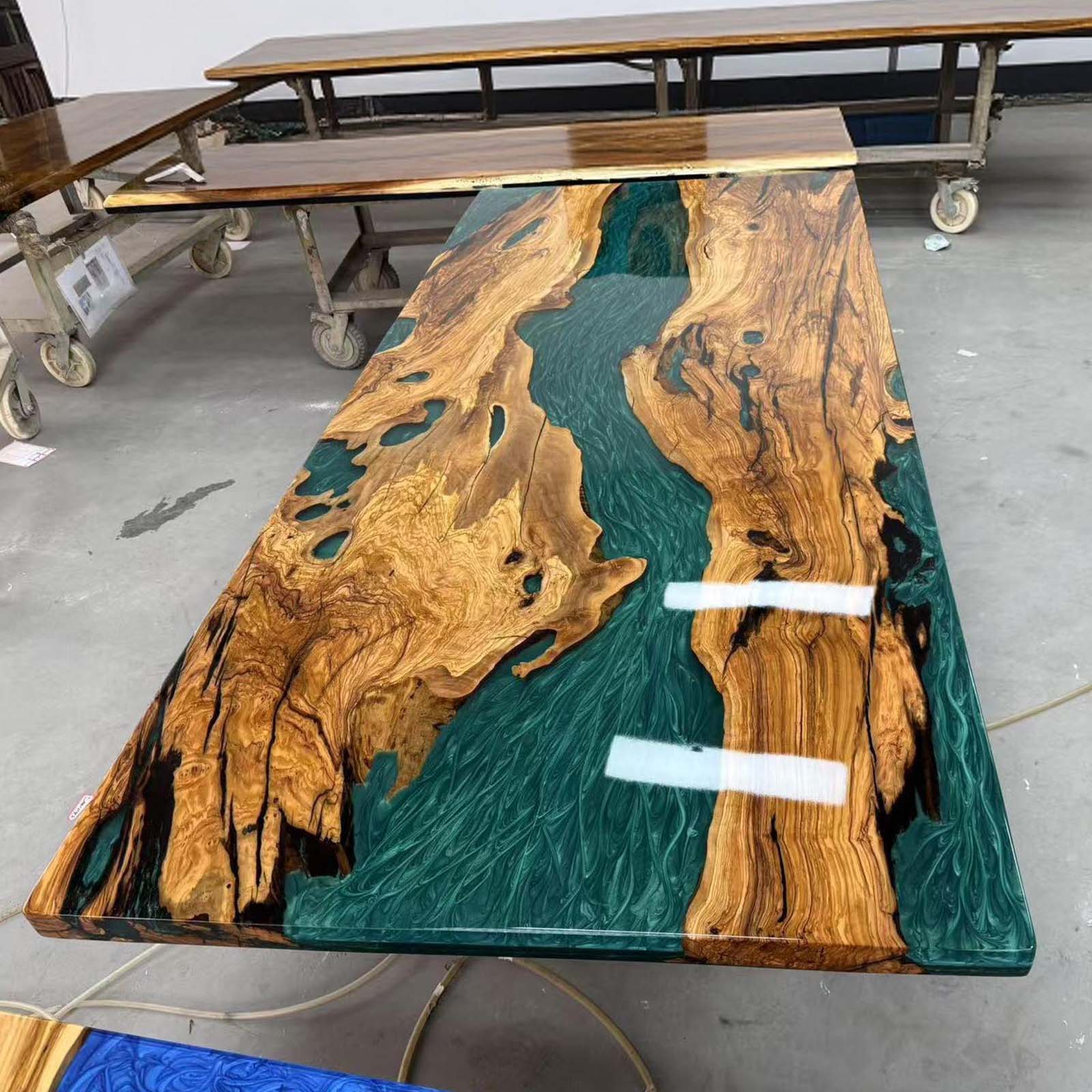 Handcrafted coffee table version of olive wood Mystic Lagoon epoxy river design, modern artisan furniture.