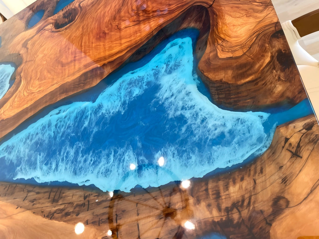 Olive wood ocean blue resin table handmade with natural live edge and glossy finish