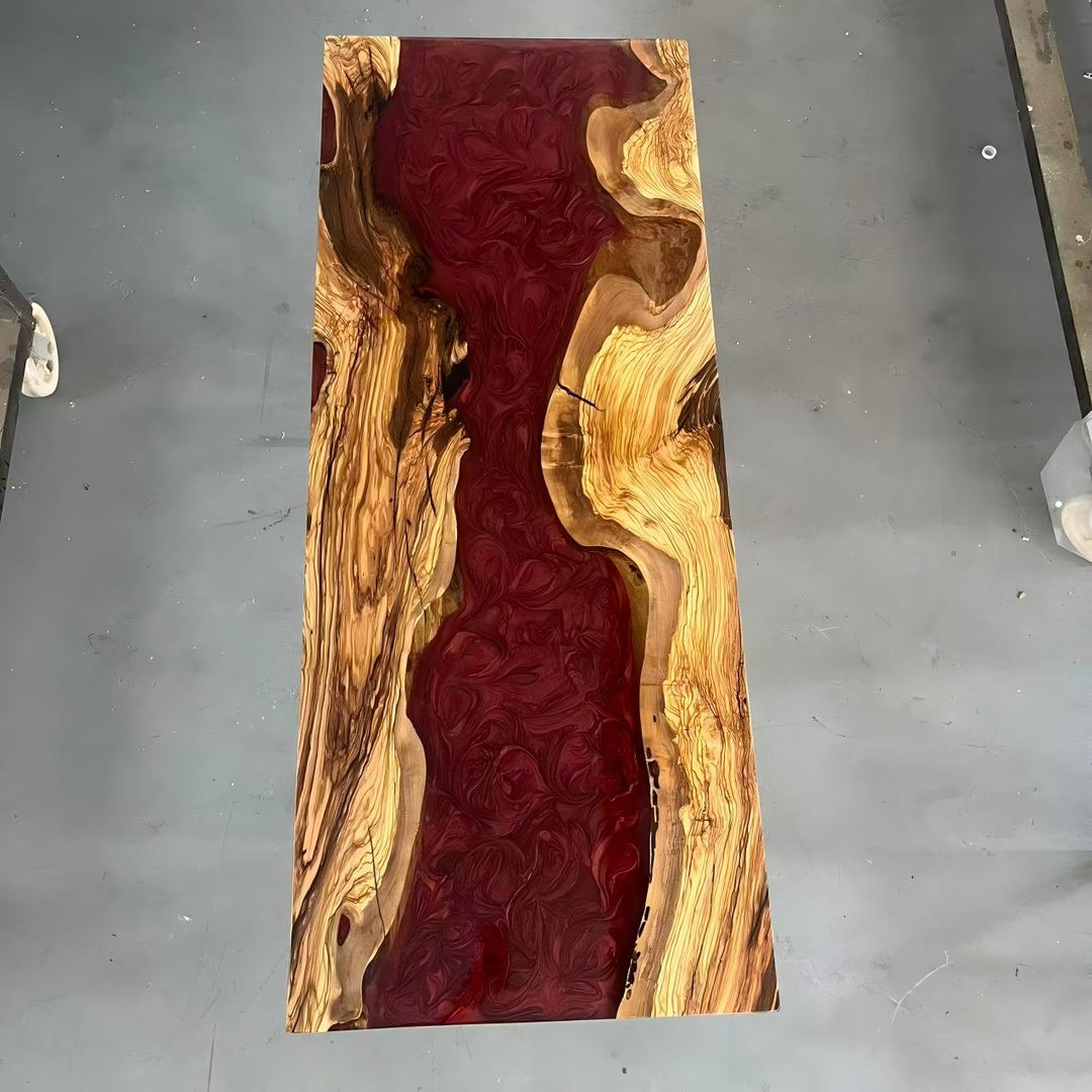 Handmade olive wood bar counter with red resin, ideal for coastal California homes