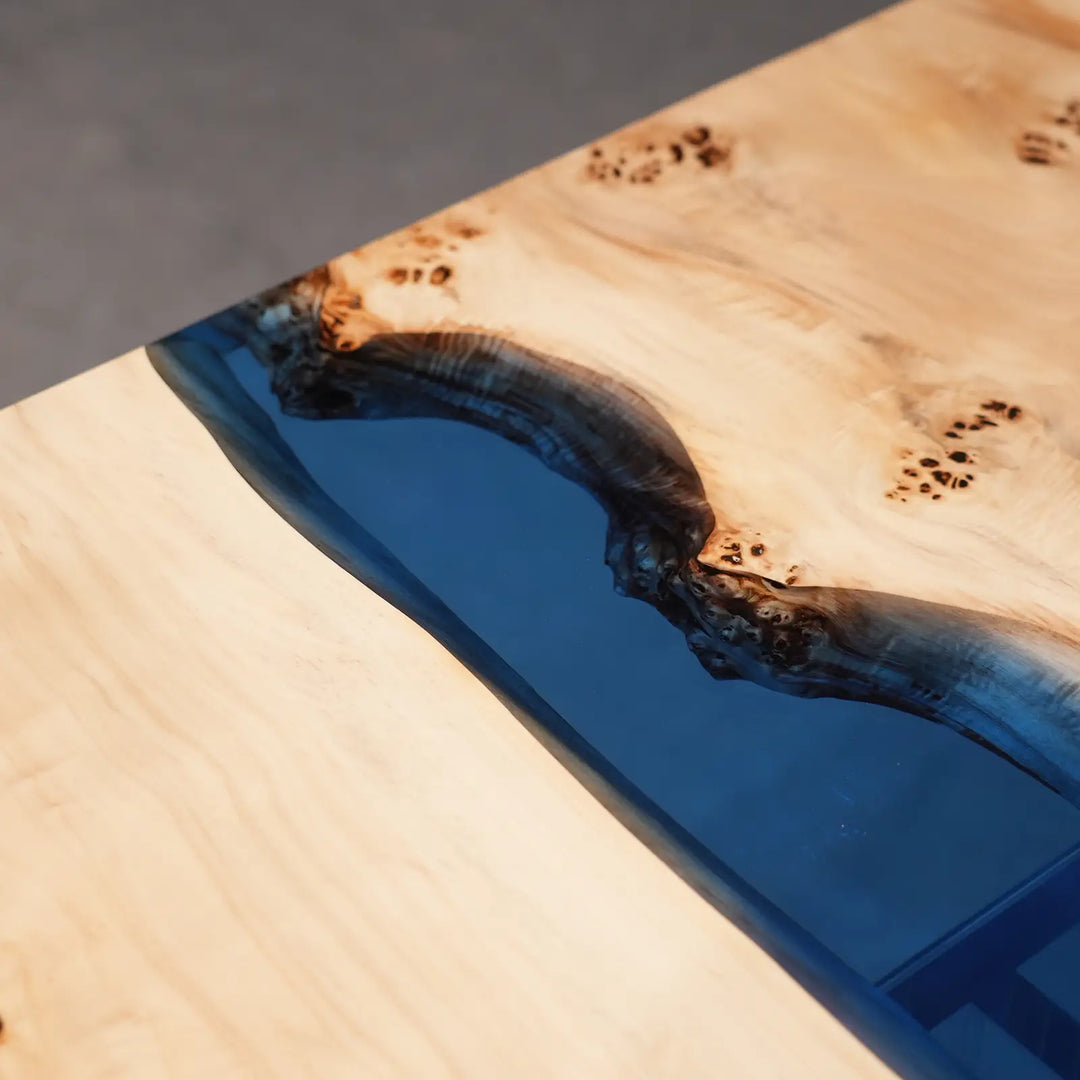 Figured Poplar wood with burl-like markings and blue epoxy by SeawaveTable