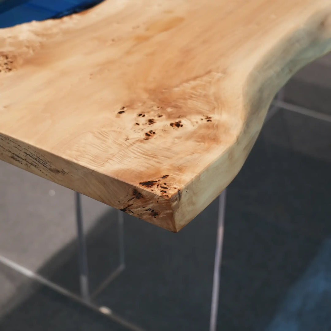Natural Poplar grain and distinctive knots beside blue epoxy by SeawaveTable
