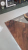 CRT-295 custom walnut river table featuring translucent black glossy resin and natural wood grain