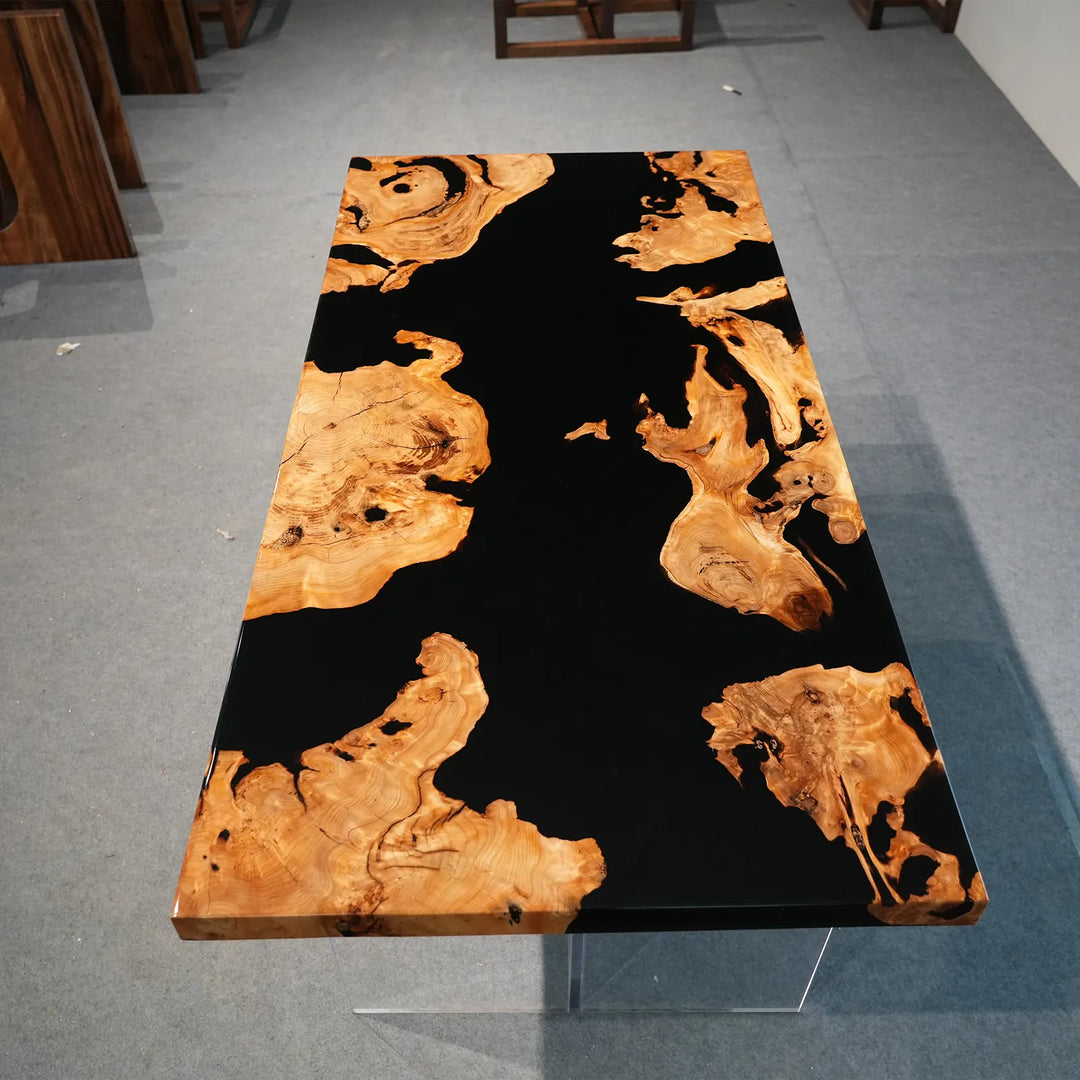 Irregular Cunninghamia wood sections surrounded by black epoxy by SeawaveTable