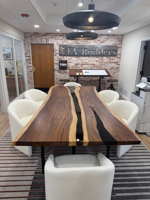 Side view of the custom Black Walnut and black resin office meeting table