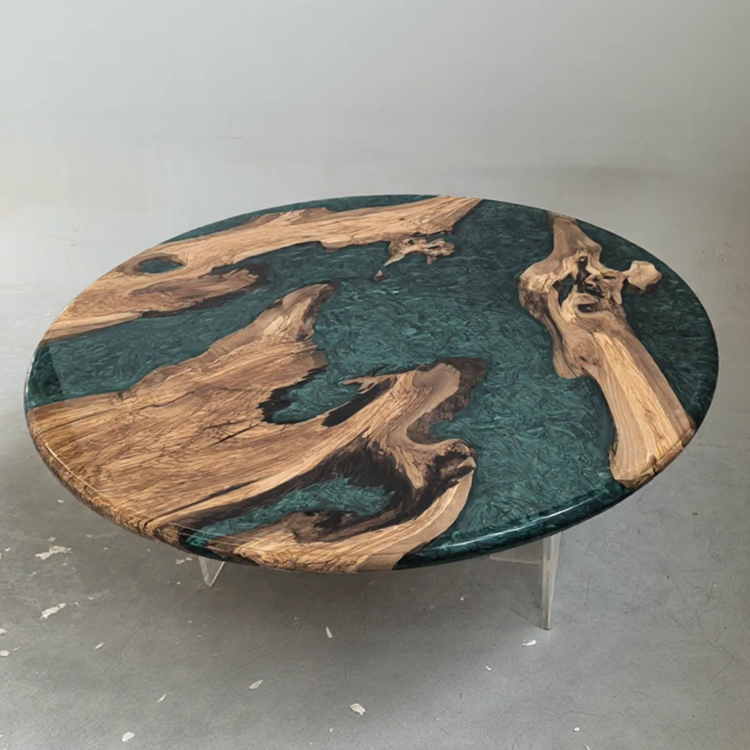 Side view of round Olive Wood and green resin dining table