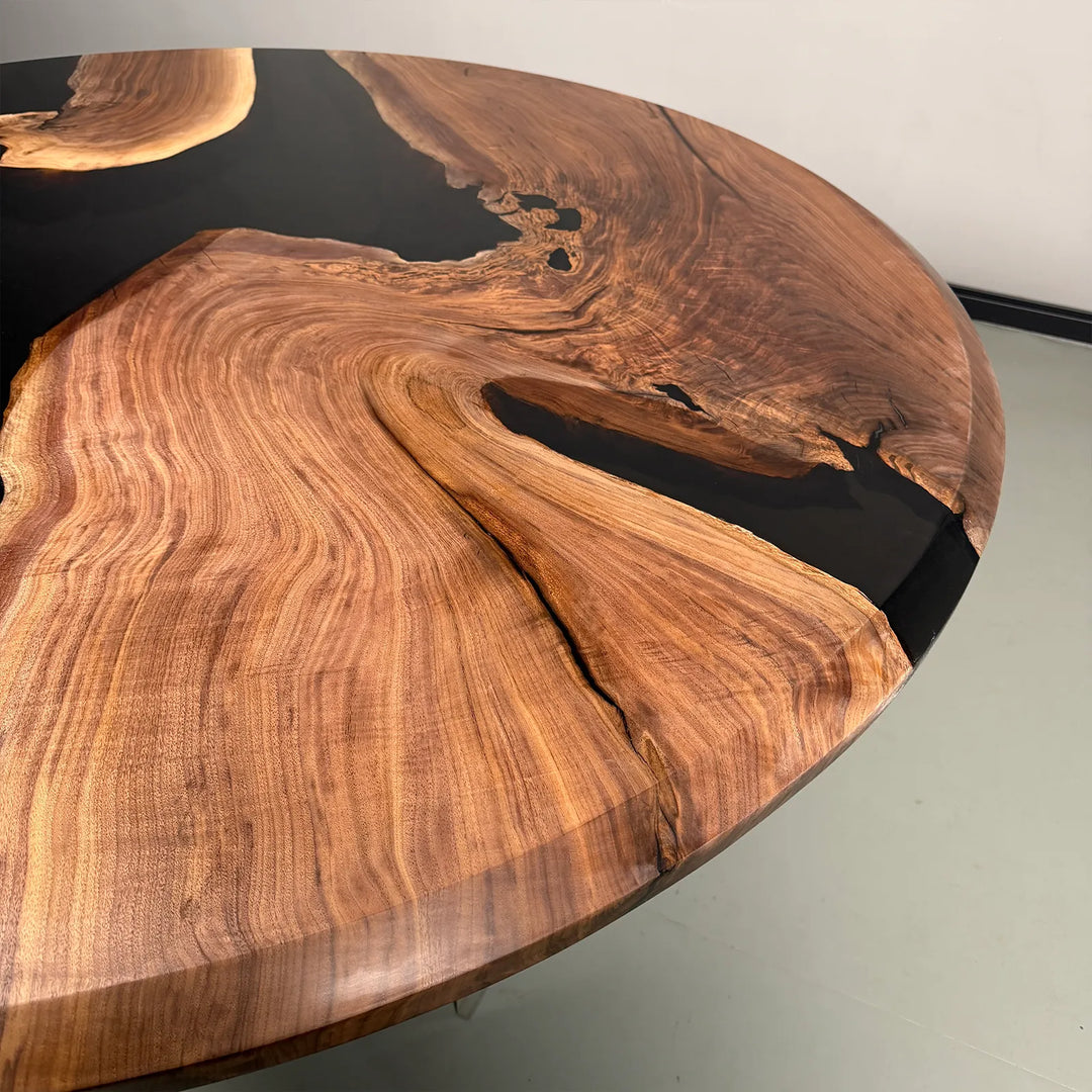 Round Black Walnut epoxy dining table with beveled edge by SeawaveTable