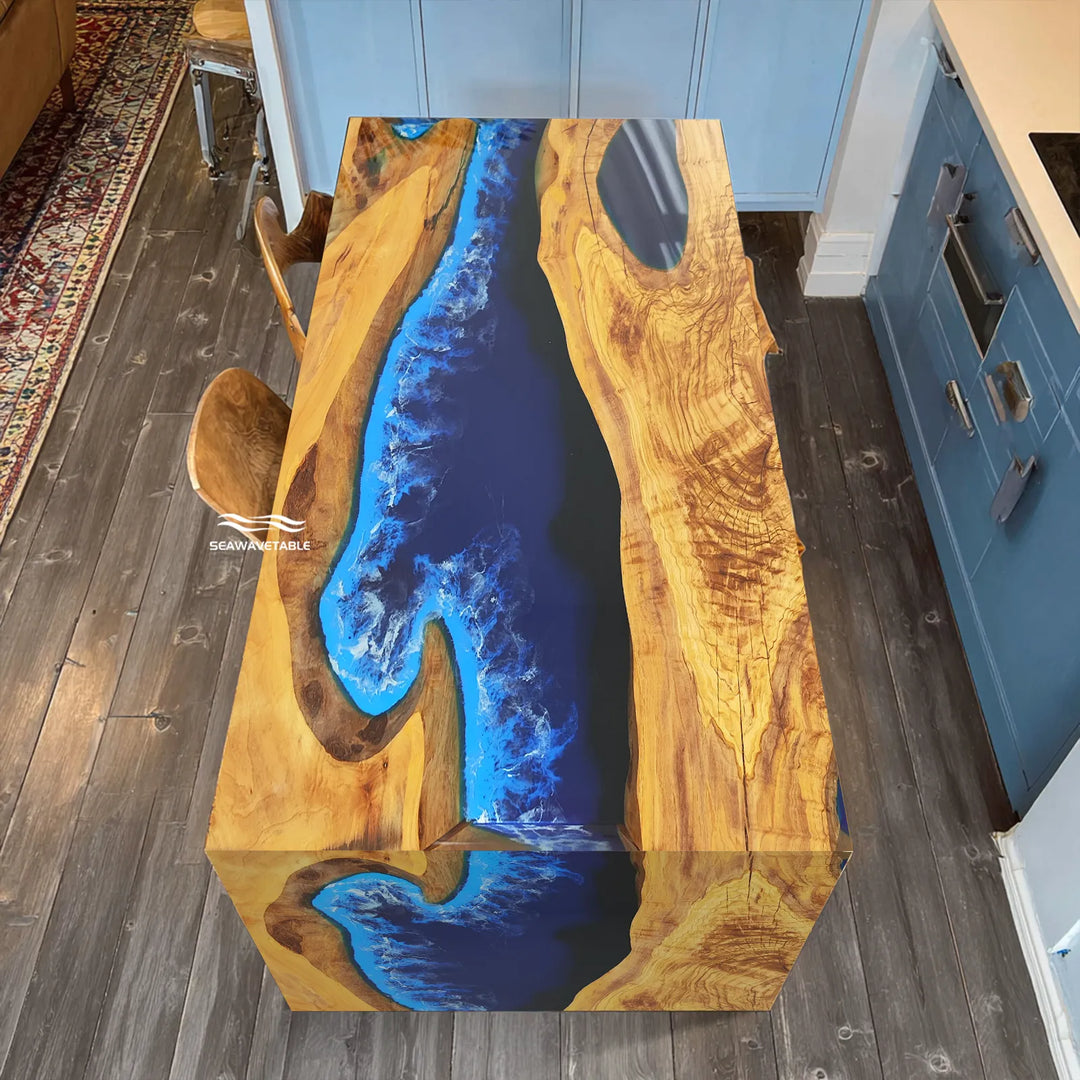 blue epoxy river detail on olive wood waterfall table surface