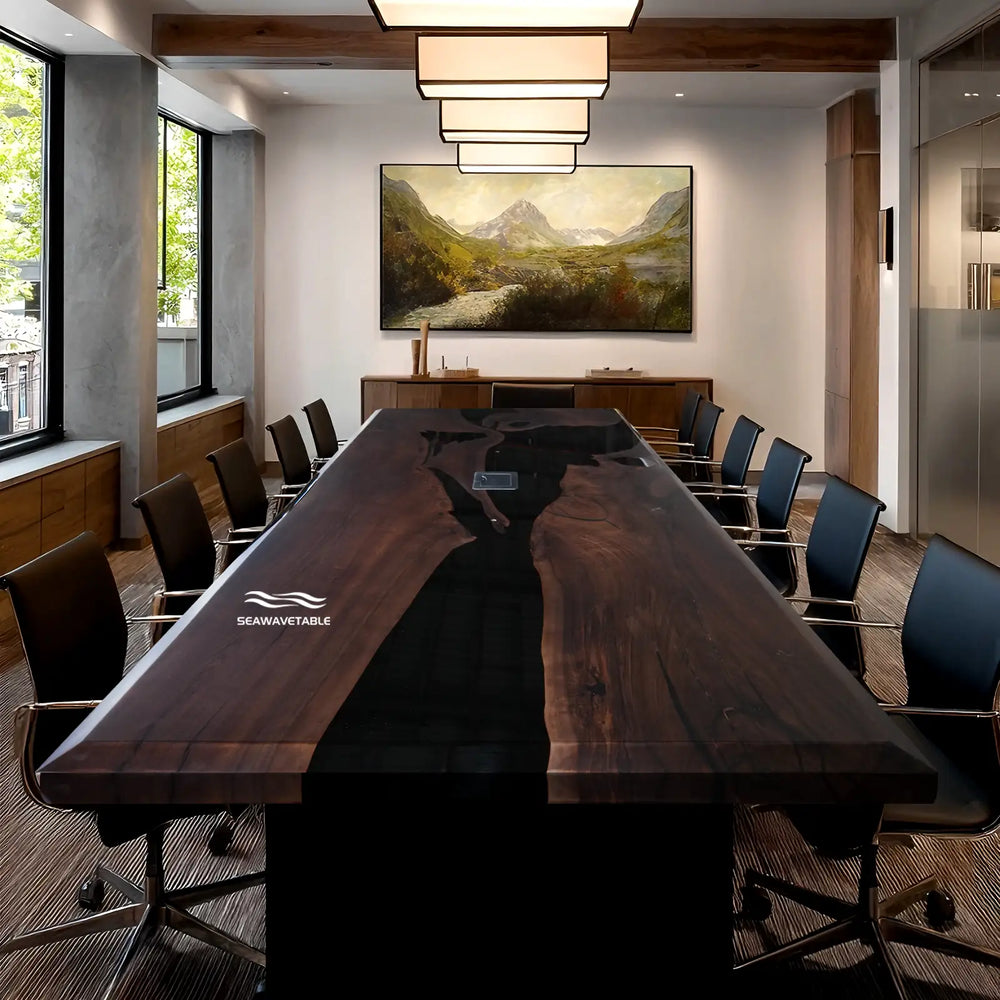SeawaveTable custom black walnut epoxy conference table with built in power outlets in luxury office space