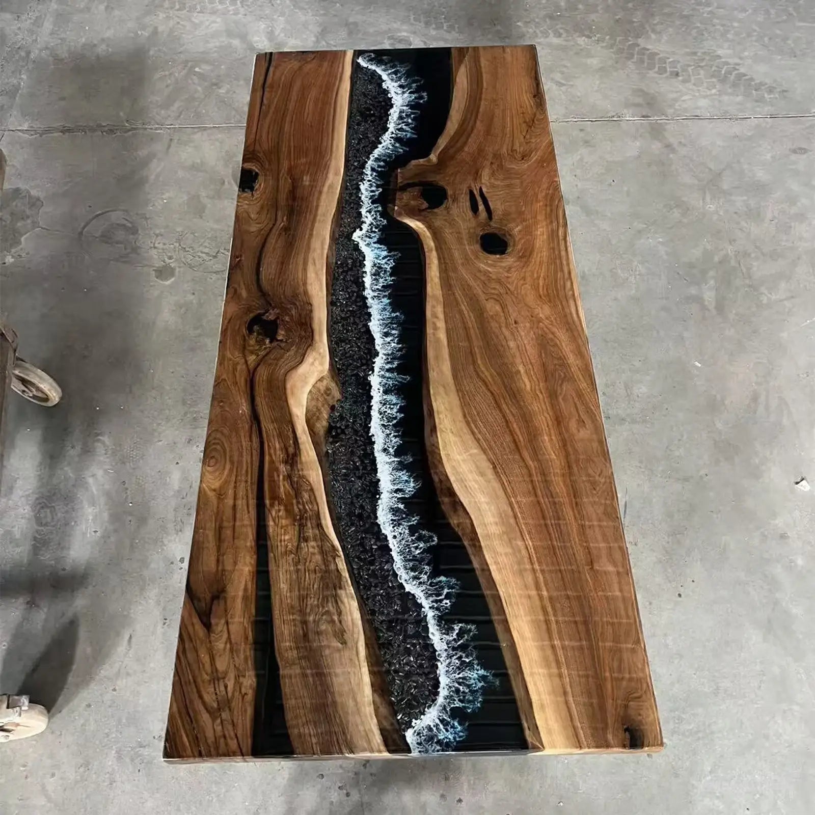 SeawaveTable finished black walnut epoxy river dining table with stone and wave design in Chicago IL