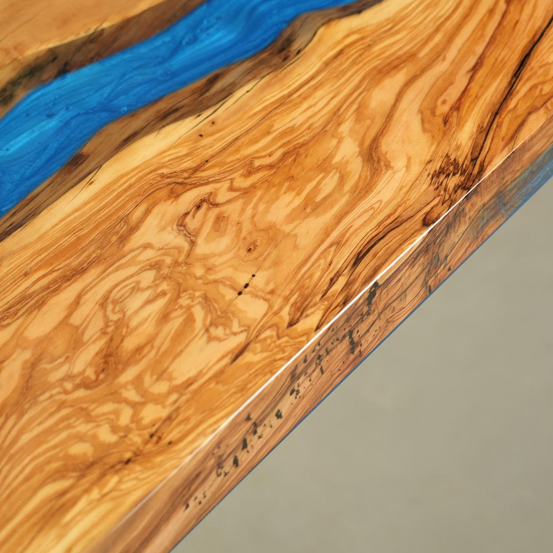 Clean straight edge design detail of modern olive wood epoxy river dining table