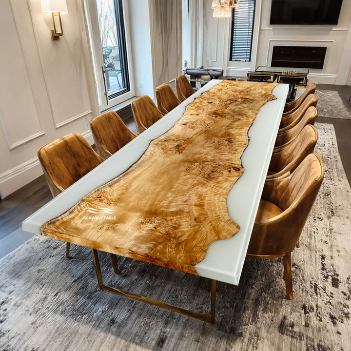 Dining room with a large wooden dining table and chairs in a modern home setting.