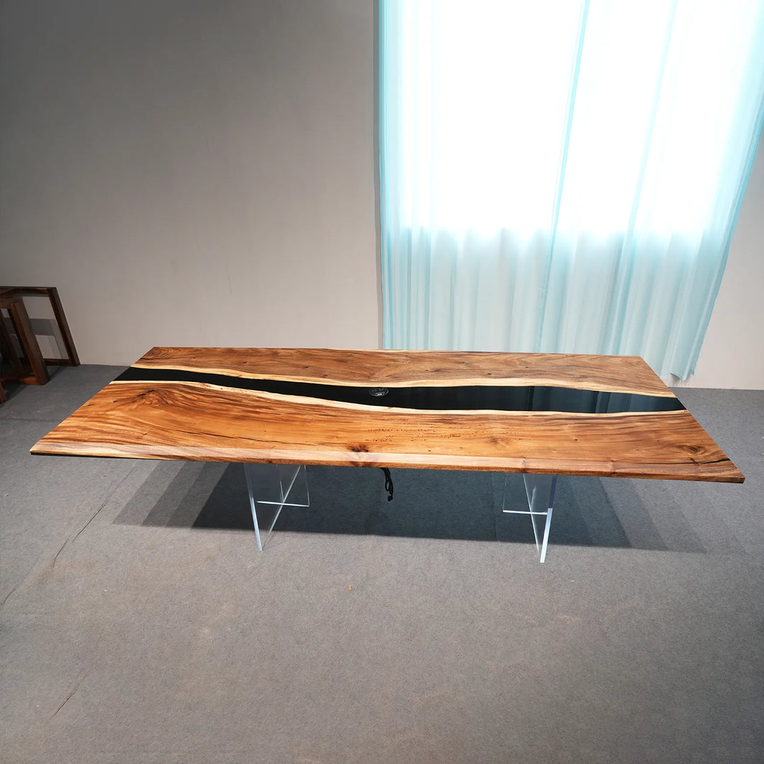 Transparent black epoxy river between natural Walnut slabs by SeawaveTable