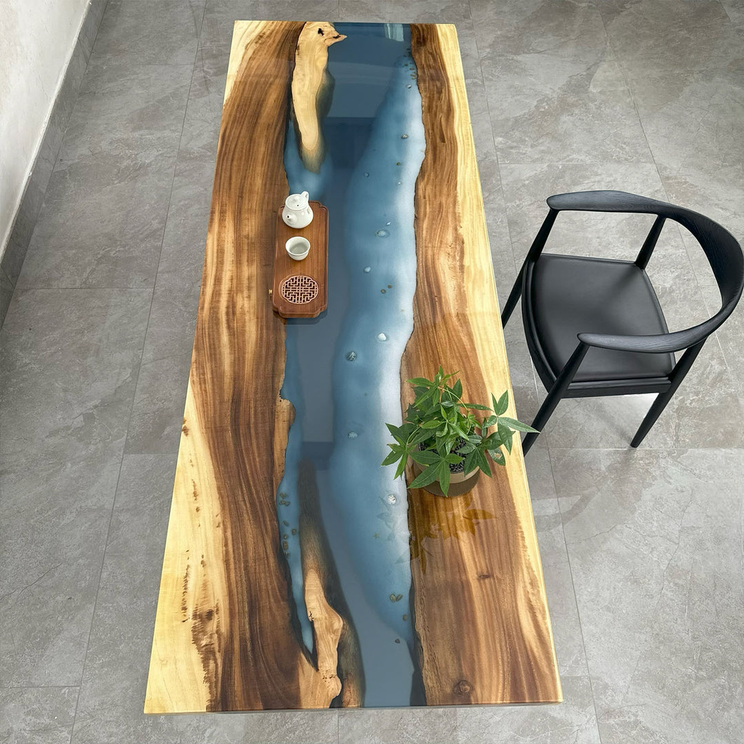 Straight edge walnut epoxy river dining table with deep blue resin near Los Angeles
