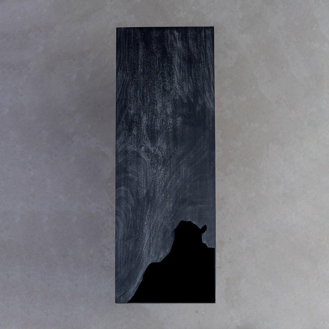 Detailed view of walnut slab texture with resin highlights