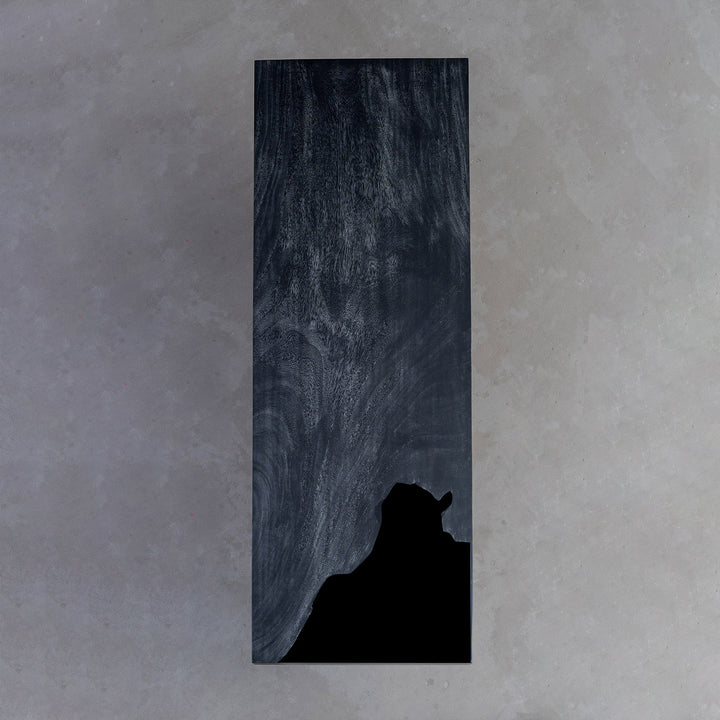 Detailed view of walnut slab texture with resin highlights